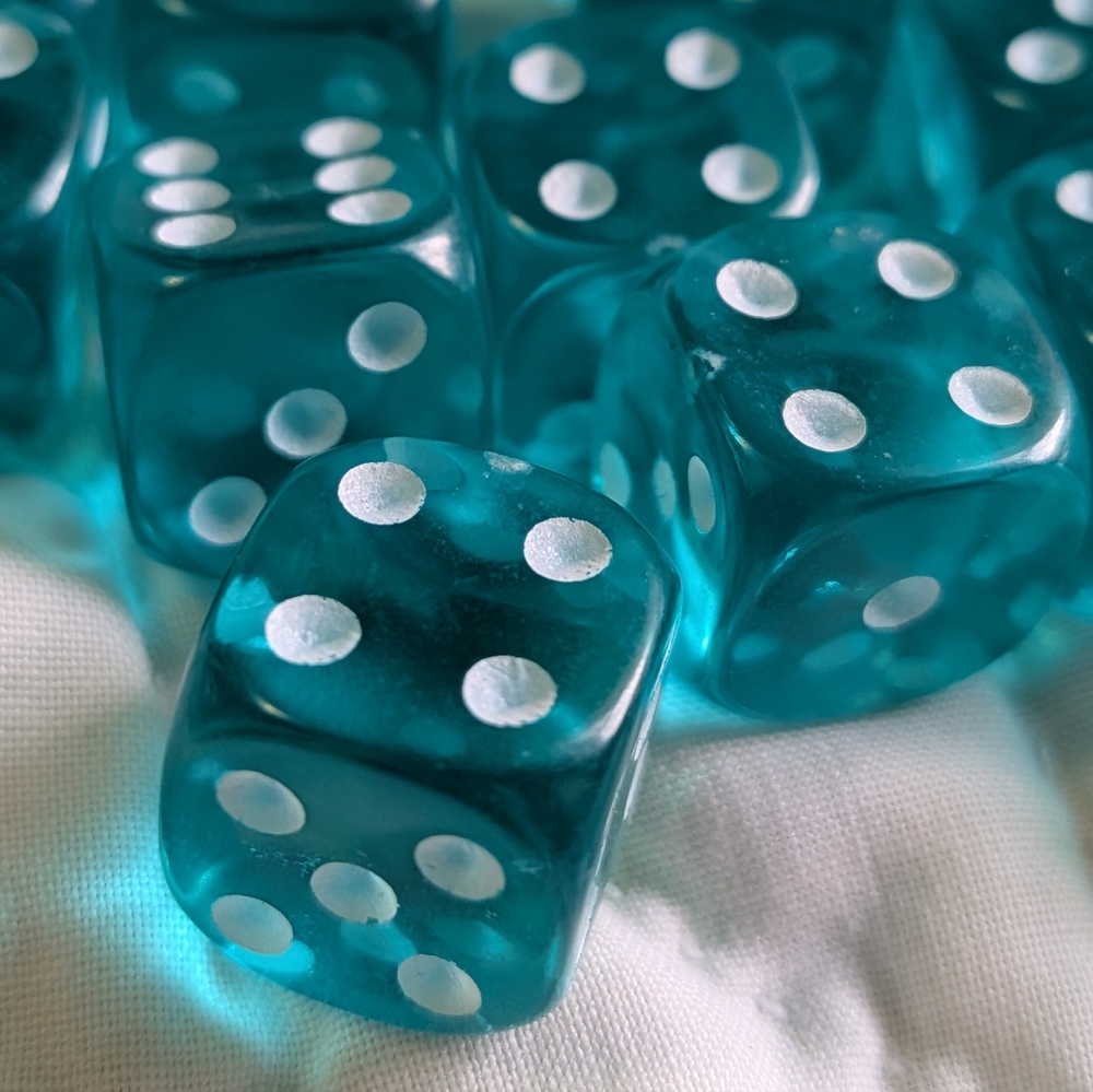 Chessex 24 Piece Light Blue Translucent Dice Set With White Dots for Board Games